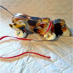 Vintage 1961 Fisher Price pull behind Snoopy dog.